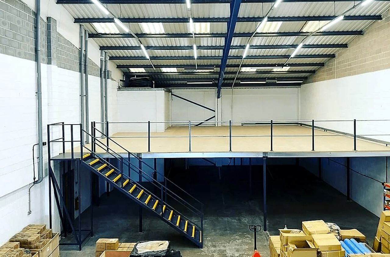 Warehouse Mezzanine with Access Stair — Mezzanine Floor Fabrication by Boss Fabrication