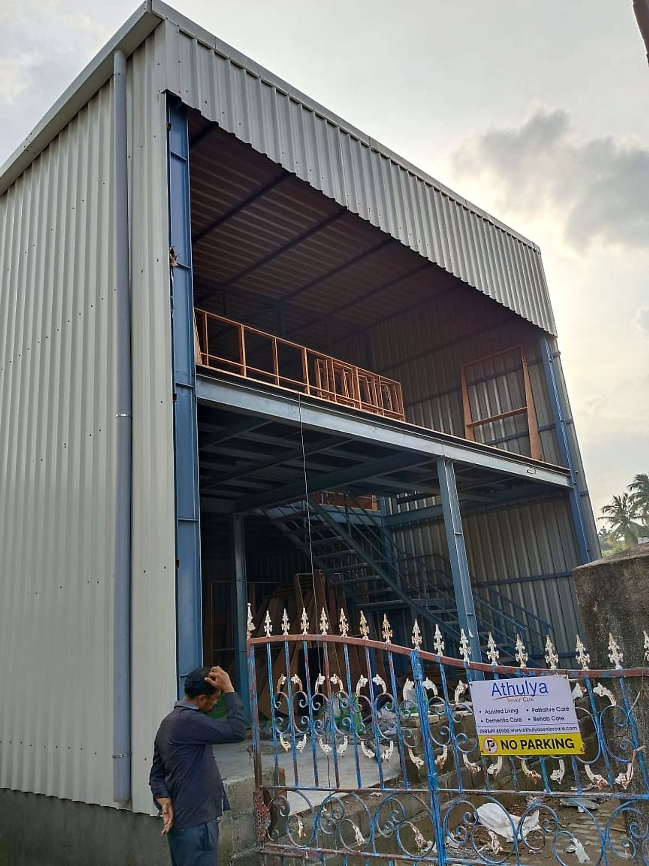 Shed with Rolling Shutter Bay — PEB & Industrial Shed Fabrication by Boss Fabrication